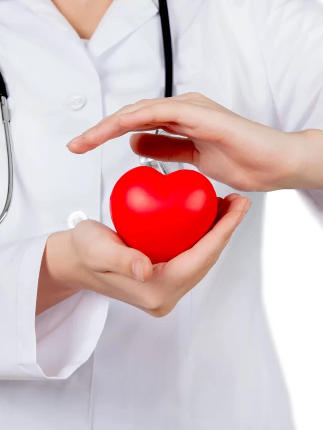 young-female-doctor-heart-background